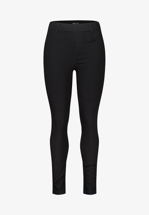 Zwarte leggings van rekbaar materiaal met een slim fit. Ze beschikken over een elastische tailleband en minimale stikdetails.