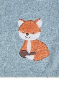 Embroidered towel featuring a fox design in orange, white, and brown on a soft blue textured background.