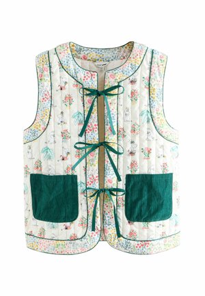 Vesta fără mâneci cu quilt, imprimată cu flori și personaje Moomin, cu trei panglici verzi în față și buzunare mari de culoare verde închis.
