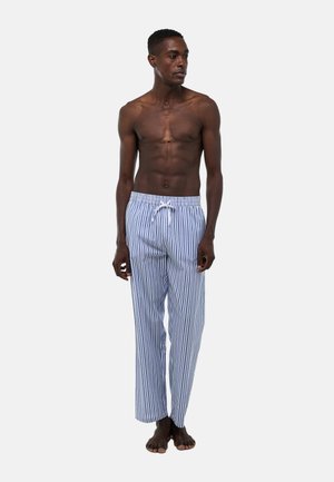 Pantalons de pyjama en coton rayés bleus et blancs, avec une taille élastique et des poches latérales, offrant une coupe décontractée et droite.