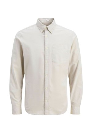 Košile s dlouhým rukávem v světle béžové bavlně, s límečkem na knoflíky, jednou náprsní kapsou a klasickým střihem se zapínáním na knoflíky.