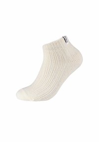 Calzino in cotone color avorio con texture a coste e tallone rinforzato. Presenta un piccolo etichetta di marca sul risvolto per l'identificazione.
