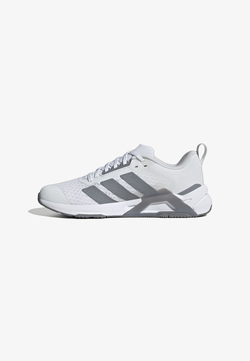 White athletic shoe with grey accents, mesh upper, textured fabric, flat laces, and a supportive heel counter. Stable rubber outsole.