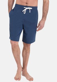Shorts bleu marine en tissu doux, dotés d'une taille avec cordon de serrage, de poches latérales et d'une coupe décontractée qui s'arrête au-dessus du genou.