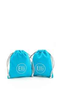 Kaks türkiissinist joonkottide, valgest ringikujulisest aktsendist "Elli by Julie & Grace" logoga, mis on valmistatud pehmest kangast.