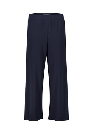 Navyblaue Schlaghose mit elastischem Bund, aus weichem, dehnbarem Stoff gefertigt, mit glatter Textur und ohne sichtbare Taschen.