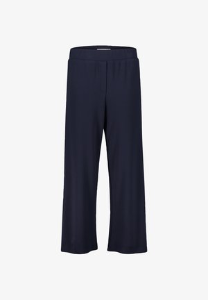 Navyblaue Schlaghose mit elastischem Bund, aus weichem, dehnbarem Stoff gefertigt, mit glatter Textur und ohne sichtbare Taschen.