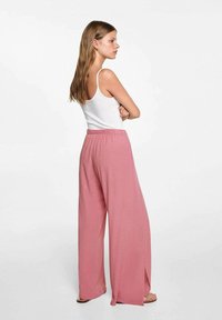 Mango Kids Hlače - pink