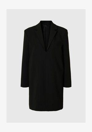 Blazer oversize nero con rever strutturato, maniche lunghe e finitura in tessuto liscia. Design semplice, senza chiusure visibili o motivi.