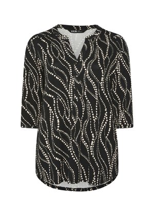 Túnica negra con escote en V y mangas tres cuartos, que presenta un patrón de olas con puntos color crema en todo su diseño. Detalle de tapeta de botones en el frente.