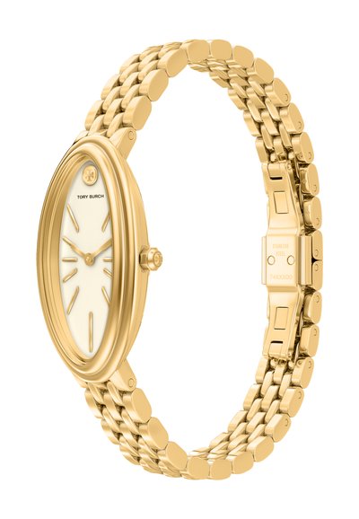 Montre-bracelet Tory Burch ton or avec cadran ovale blanc, marqueurs dorés et bracelet à maillons avec fermoir en acier inoxydable.