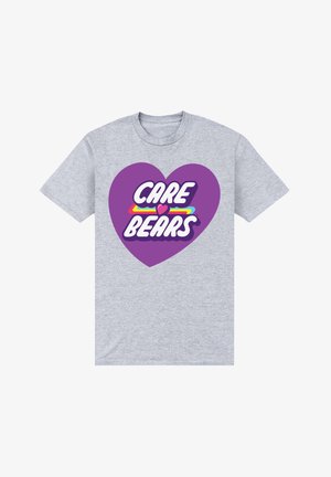 Grå bomulds t-shirt med et stort grafik af et lilla hjerte og teksten "CARE BEARS" i hvid samt en farverig linje nedenunder.