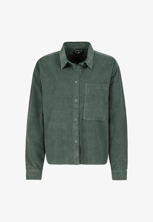 Green corduroy shirt with a button-up front, pointed collar, single chest pocket, and long sleeves. Soft texture and relaxed fit.