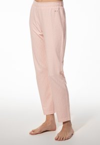 Lichte, roze pyjamabroek met een bladerenpatroon, elastische tailleband, taps toelopend ontwerp en zachte textuur, geschikt voor casual draag.