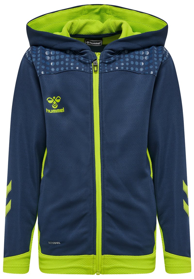 Giacca a zip con cappuccio blu navy, caratterizzata da dettagli in verde lime, un design testurizzato e un motivo a pois sulle spalle. Logo Hummel sul petto.