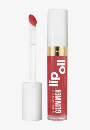 Tube d’huile pour les lèvres Revlon Super Lustrous Glimmer avec un bouchon blanc et un applicateur, montrant une huile à lèvres rouge sur l’embout en éponge.