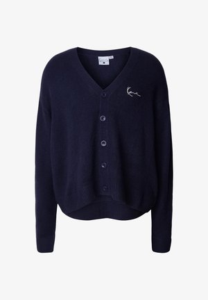 Granatowy kardigan z dekoltem w serek, sześcioma guzikami, prążkowanym dołem i mankietami, z małym haftem po lewej stronie klatki piersiowej.