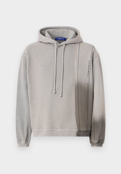 Gray fleece hoodie with a drawstring hood, featuring a textured panel and printed branding on the side. Slim fit with ribbed cuffs.