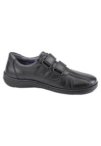 Black leather shoe with dual Velcro straps, rounded toe, and a sturdy rubber sole. Features stitched detailing along the side.