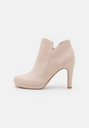 Bottines à talons hauts - beige