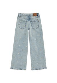 Helehallid laia säärega teksad denimist, millel on laiali laotatud kollase ja valge lillelisi tikandeid. Silmapaistvad tagataskud ja bränditud silt.