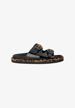 Black patent slide sandals with double buckle straps and a leopard print textured sole. Flat rubber footbed with a contrasting animal pattern.