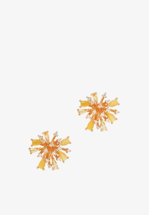 Øreringe i guldfarve med gule dråbeformede sten og små klare krystaller arrangeret i et blomsterudbrudsmønster.