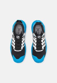 Salomon PATROL UNISEX - Sapatos de caminhada - black/blithe/white