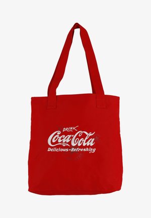 Geantă din țesătură roșie, cu logo-ul "Coca-Cola" în alb, având textul "Delicios-Răcoritor." Mânere duble robuste pentru o transportare ușoară.