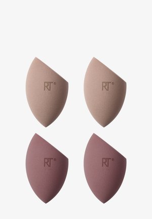 Fire vinklet makeup-blendesvampe i rosa og mauve nuancer, hver præget med "RT" logo, arrangeret i et 2x2 gitter på en hvid baggrund.