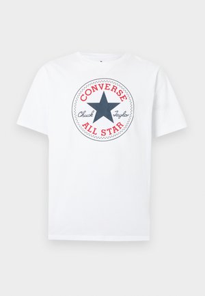 White cotton t-shirt featuring a circular graphic with a blue star, red and black text reading "CONVERSE" and "ALL STAR" with "Chuck Taylor."