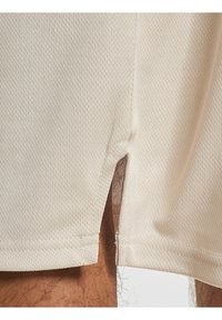 DEF PRINT  - Jogginghose - beige