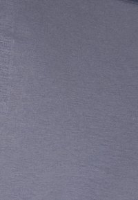 Purple fabric with a smooth, slightly ribbed texture; uniform color with no visible patterns or accents. Suitable for various apparel uses.