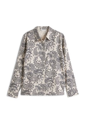 Lange mouw beige shirt met zwarte en witte ingewikkelde paisley patronen, verspreide kraag en knoopsluiting aan de voorkant.