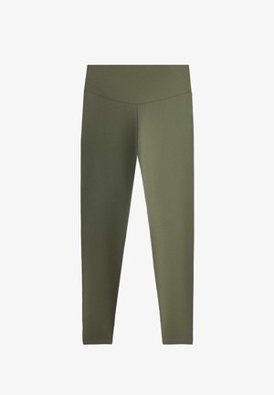 Olivengroene, hooggetailleerde legging tot op de enkels met een gladde, naadloze tailleband en smal zittende pijpen.