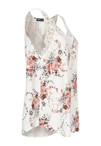 Witte tanktop met bloemenprint, voorzien van een V-hals, kanten accenten op de schouders en roze en blauwe bloemmotieven met een gebogen zoom.