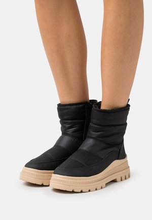 s.Oliver Botas para la nieve - black