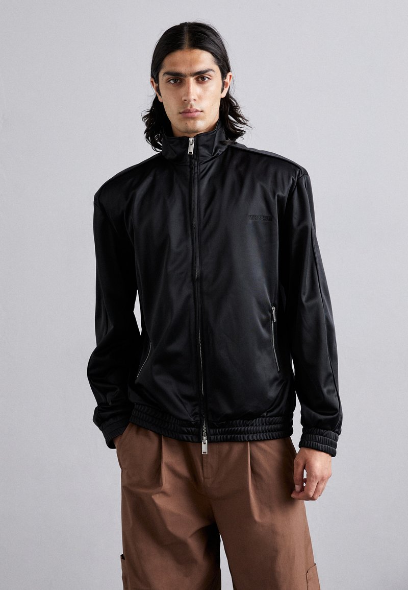 Han Kjøbenhavn - OVERSIZED TRACK - Chaqueta de entrenamiento - black, Ampliar