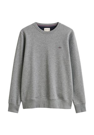 Sweat-shirt gris clair à col rond, manches longues, poignets et ourlet côtelés, avec un petit logo brodé sur la poitrine gauche.