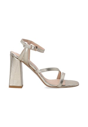 Metallic silver high-heeled sandal with block heel, two front straps, and ankle strap with buckle. Smooth texture and open toe design.