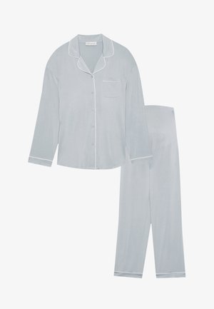 Light blue pajama set made of soft fabric, featuring a collared button-up top with a chest pocket and matching elastic waist pants with cuffs.
