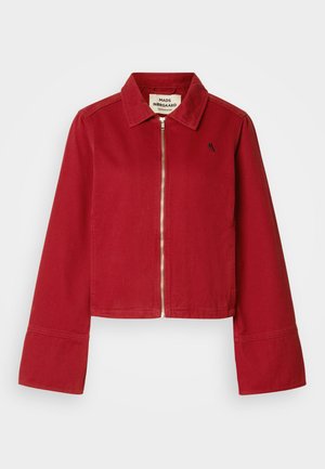 Red cropped jacket with a collar and front zipper. Features flared sleeves and a small embroidered logo on the left chest. Cotton material.