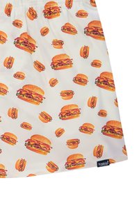 Gonna bianca in tessuto con un motivo ripetuto di illustrazioni di hamburger colorati, che mostrano dettagli di lattuga, bacon e formaggio.