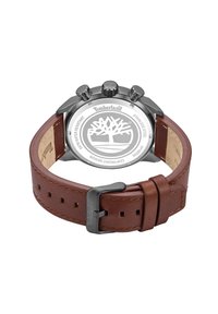 Orologio Timberland con cassa in acciaio inossidabile, cinturino in pelle marrone e design minimalista con logo sul retro. Impermeabile fino a 50 metri.