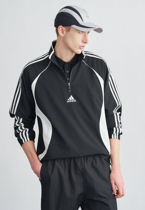 TEAMGEIST - Casaco de treino - black/white