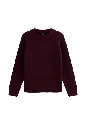 Jersey burdeos de punto con cuello redondo, mangas largas tipo raglán y un dobladillo ligeramente recortado. Textura suave y tejido elástico.