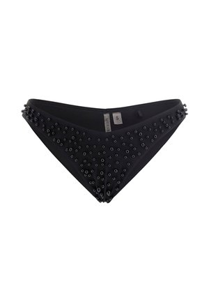 Black bikini bottom with a triangular cut, featuring decorative black grommets on one side. Material appears smooth and elastic. Size tag visible.