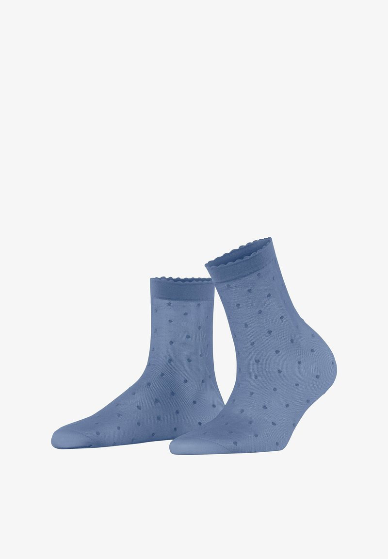 Chaussettes de cheville à pois bleus, fabriquées en tissu léger, avec des bords festonnés et une texture lisse. Conçues pour le confort et le style.