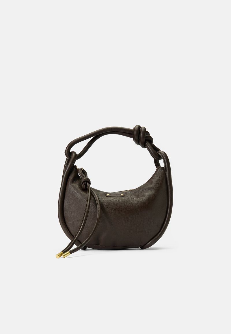 Brown leather shoulder bag with a curved shape, knotted handle, and gold-tone hardware. Features a textured surface and zip closure.