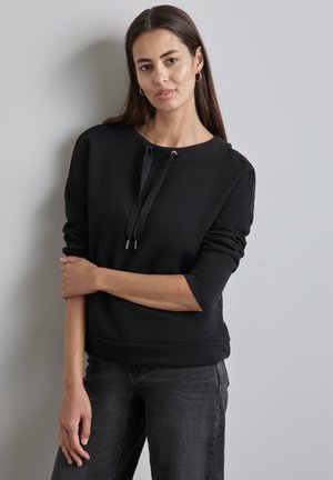 Schwarzer Sweatshirt mit langen Ärmeln und Rundhalsausschnitt, verfügt über eine Kordelzugverschluss, glatte Textur und eine legere Passform.